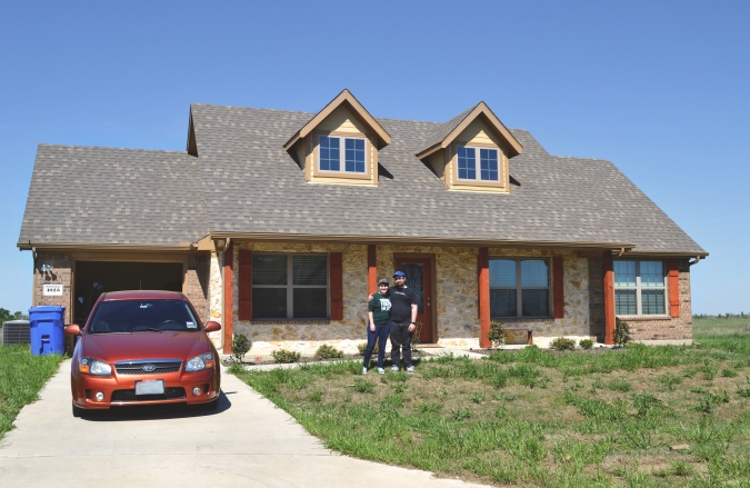 This is our beautiful new house! (our friend's car though)